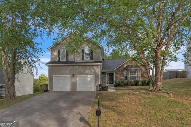 831 Kendall Park Dr, Winder, GA 30680 - traditional-style home with driveway and a garage