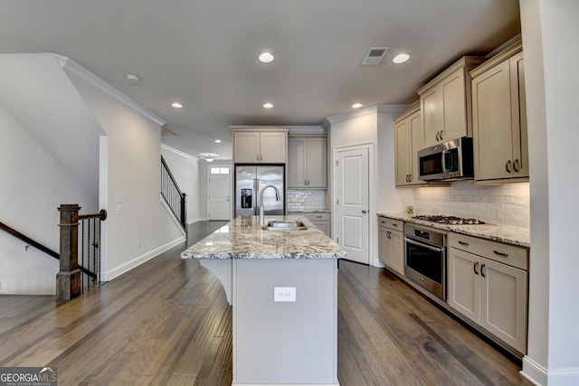 kitchen with recessed lighting, visible vents, appliances with stainless steel finishes, and a sink