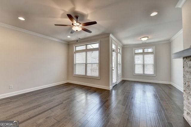 unfurnished living room featuring visible vents, a ceiling fan, ornamental molding, dark wood-type flooring, and baseboards