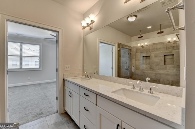 full bathroom featuring a sink, visible vents, and a stall shower