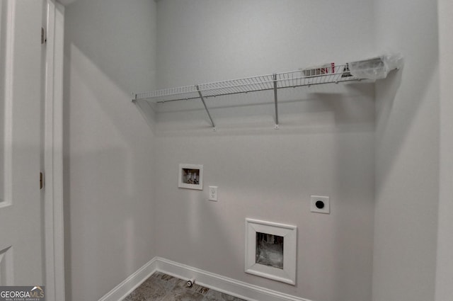 clothes washing area featuring baseboards, laundry area, hookup for an electric dryer, and hookup for a washing machine