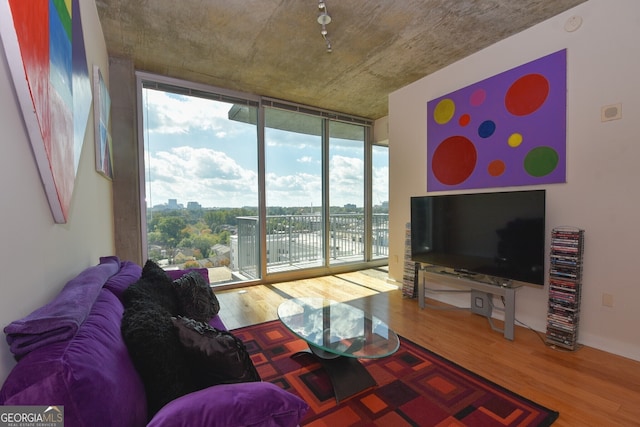 361 17th St NW Unit 1107, Atlanta, GA 30363 - living area with expansive windows and wood finished floors