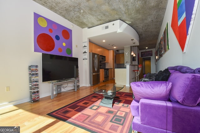 361 17th St NW Unit 1107, Atlanta, GA 30363 - living room featuring wood finished floors