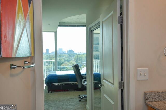 361 17th St NW Unit 1107, Atlanta, GA 30363 - bedroom featuring carpet floors, a city view, and floor to ceiling windows