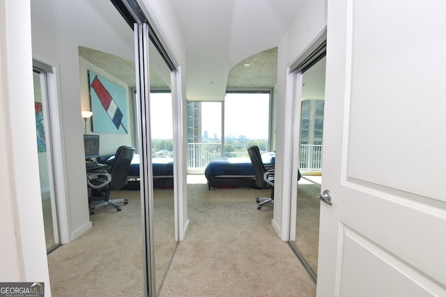 361 17th St NW Unit 1107, Atlanta, GA 30363 - hallway featuring light colored carpet and an office area