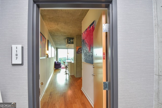 361 17th St NW Unit 1107, Atlanta, GA 30363 - hall with wood finished floors and baseboards