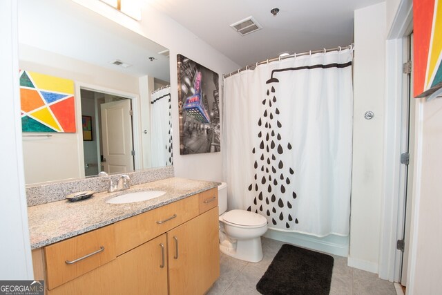 361 17th St NW Unit 1107, Atlanta, GA 30363 - bathroom with vanity and tile patterned flooring