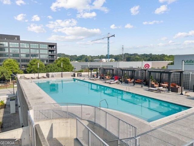 361 17th St NW Unit 1107, Atlanta, GA 30363 - community pool with an outdoor hangout area
