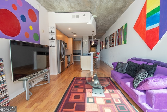 361 17th St NW Unit 1107, Atlanta, GA 30363 - living room with light wood-style floors