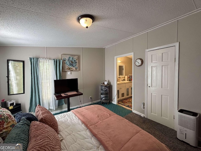 63 Breezewood Dr, Hampton, GA 30228 - carpeted bedroom featuring ensuite bathroom and a textured ceiling
