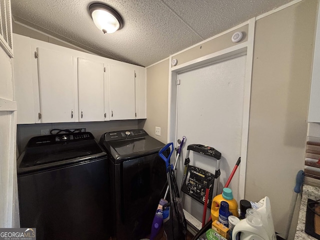 63 Breezewood Dr, Hampton, GA 30228 - washroom featuring cabinet space, washing machine and dryer, and a textured ceiling