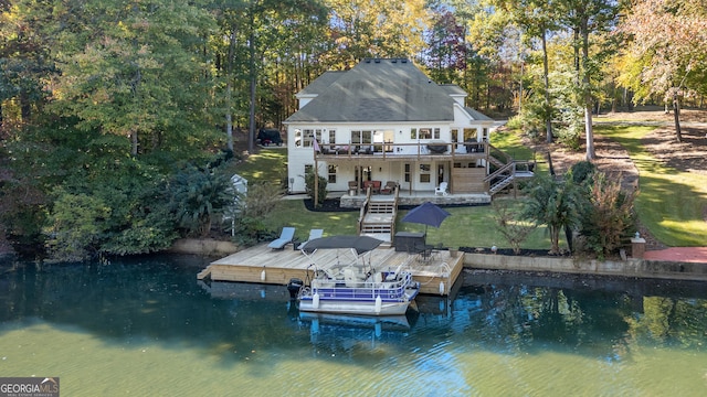 10005 Lakeview Pkwy, Villa Rica, GA 30180 - rear view of house featuring a deck with water view, a yard, stairs, and a patio area