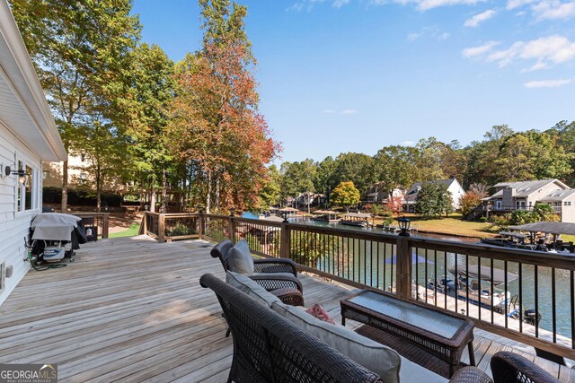 10005 Lakeview Pkwy, Villa Rica, GA 30180 - wooden deck featuring a water view and area for grilling