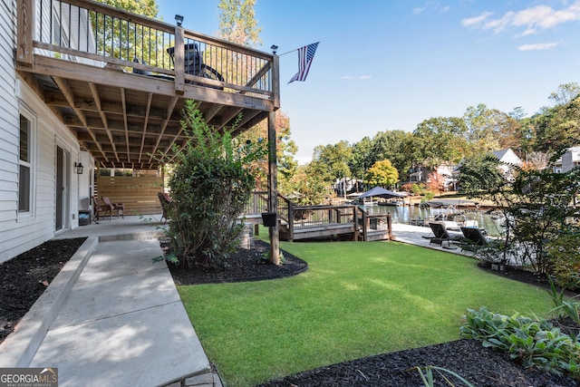 10005 Lakeview Pkwy, Villa Rica, GA 30180 - view of grassy yard with a patio and a wooden deck