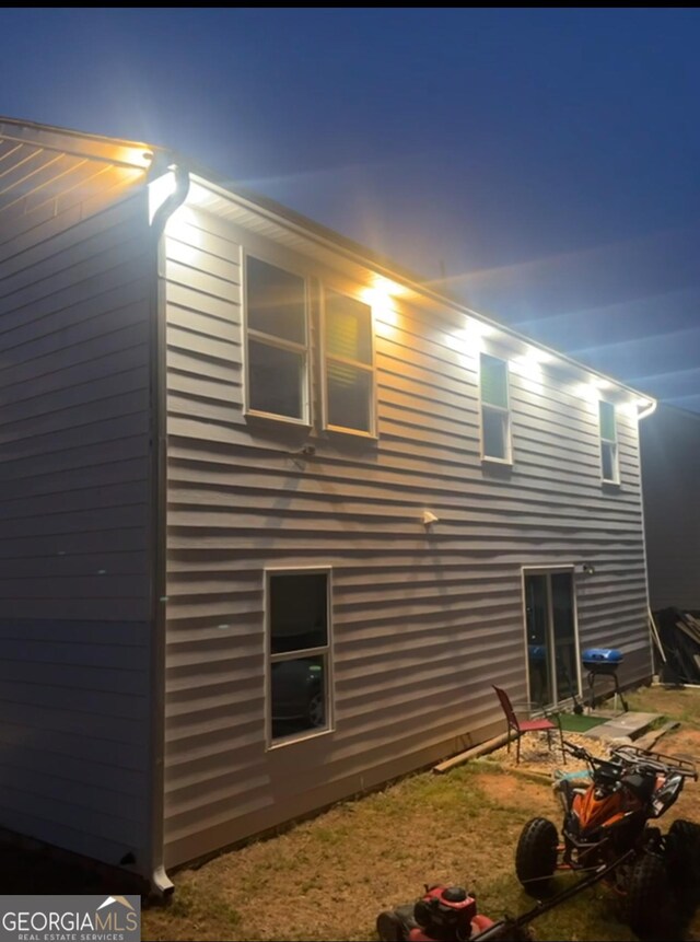 rear view of property with a patio area