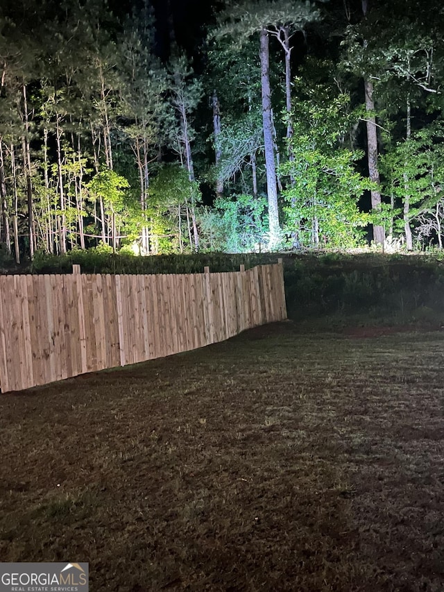 view of yard with fence
