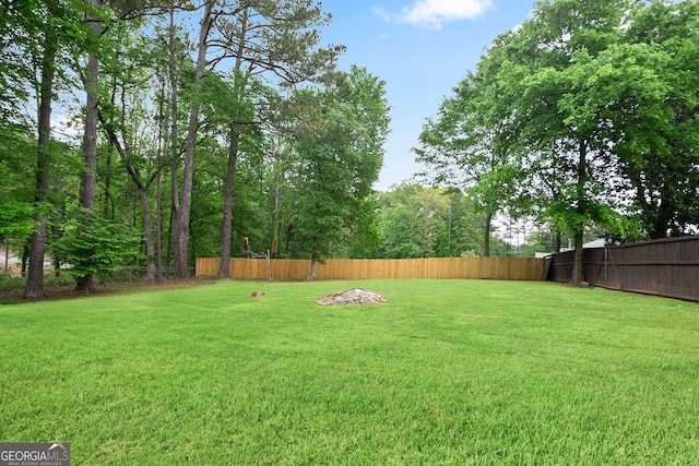 view of yard featuring fence