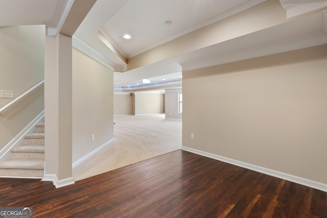 interior space featuring baseboards, recessed lighting, wood finished floors, stairs, and ornamental molding