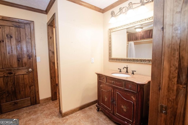 full bathroom featuring tile patterned flooring, baseboards, crown molding, and vanity