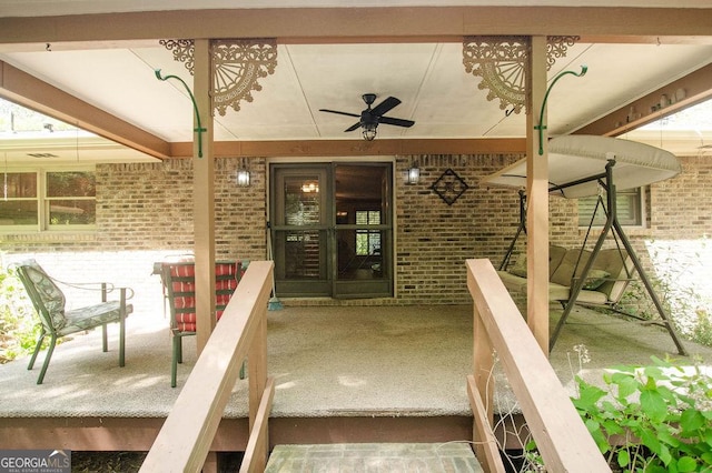 view of patio / terrace featuring ceiling fan