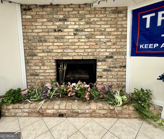 room details featuring a brick fireplace