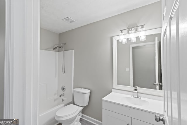 bathroom featuring visible vents, toilet, vanity, shower / tub combination, and a textured ceiling