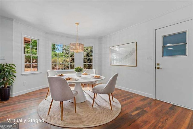 255 White Pines Dr, Alpharetta, GA 30004 - dining room featuring baseboards, wood finished floors, a notable chandelier, and ornamental molding