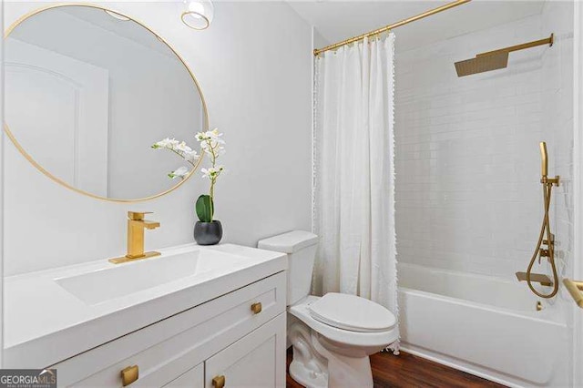 255 White Pines Dr, Alpharetta, GA 30004 - bathroom with shower / tub combo, toilet, vanity, and wood finished floors