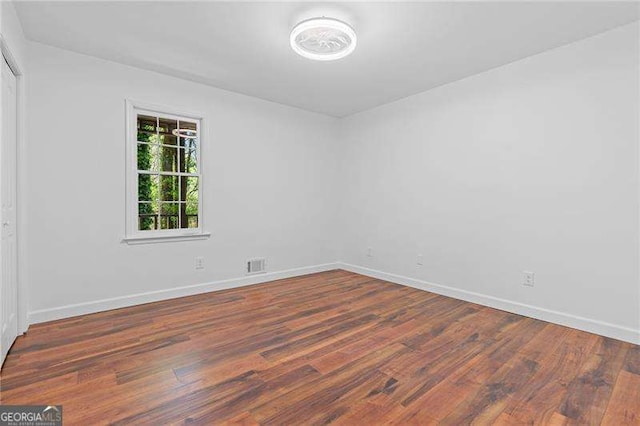 255 White Pines Dr, Alpharetta, GA 30004 - unfurnished room featuring wood finished floors, visible vents, and baseboards