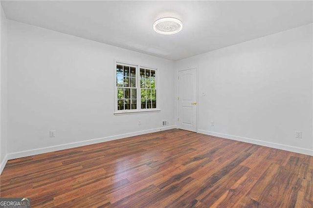 255 White Pines Dr, Alpharetta, GA 30004 - empty room with wood finished floors and baseboards