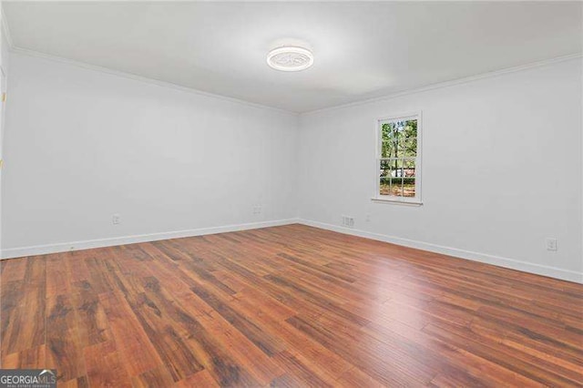 255 White Pines Dr, Alpharetta, GA 30004 - spare room with baseboards, crown molding, and wood finished floors
