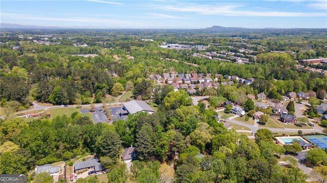 255 White Pines Dr, Alpharetta, GA 30004 - drone / aerial view featuring a view of trees