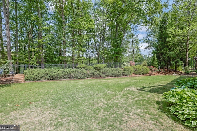 view of yard with fence