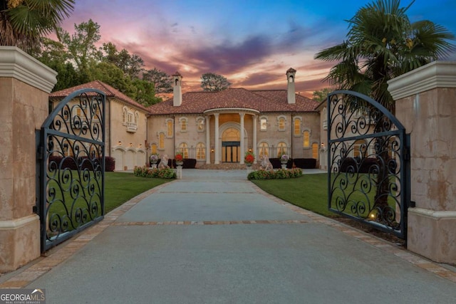 720 Heards Ferry Rd, Atlanta, GA 30328 - view of gate featuring a lawn