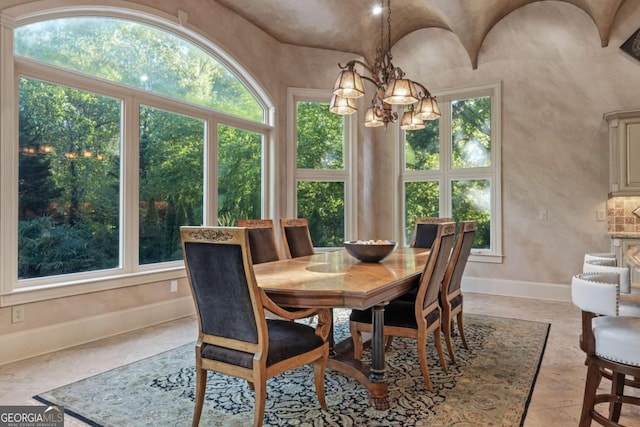 720 Heards Ferry Rd, Atlanta, GA 30328 - dining room with plenty of natural light, baseboards, and a chandelier