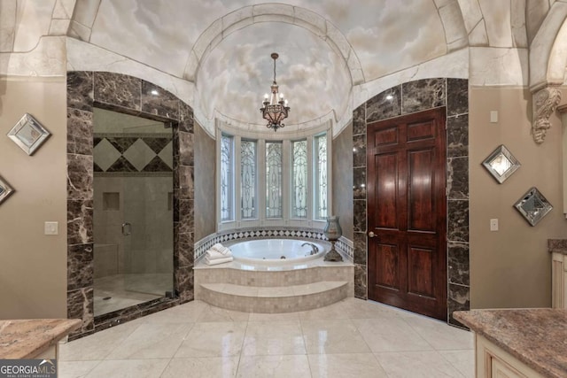 720 Heards Ferry Rd, Atlanta, GA 30328 - bathroom featuring a stall shower, vanity, marble finish floor, a jetted tub, and a notable chandelier
