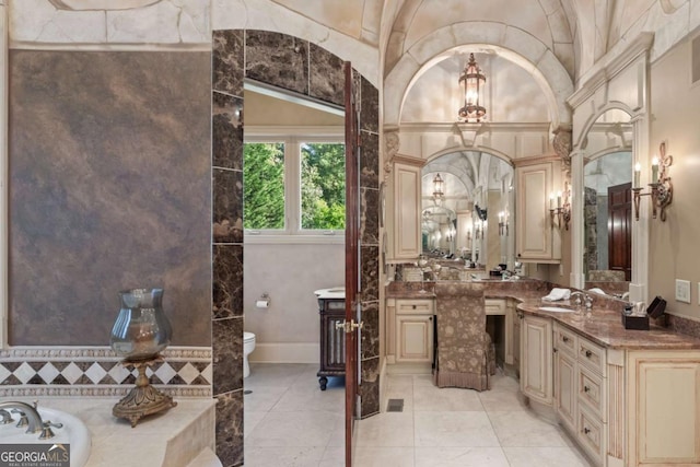 720 Heards Ferry Rd, Atlanta, GA 30328 - full bath with a bathing tub, tile patterned floors, vanity, and toilet