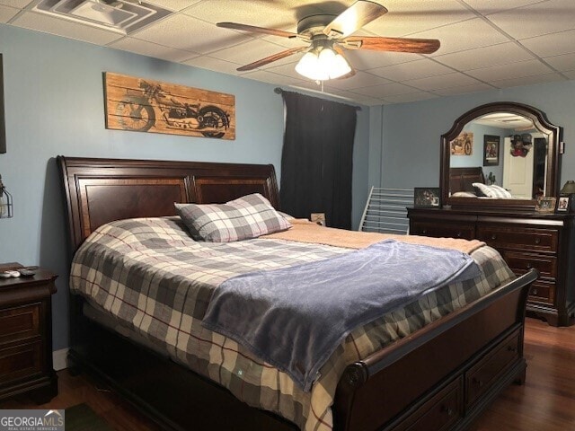 266 W Troutman Rd NE, Rome, GA 30165 - bedroom with dark wood finished floors, a paneled ceiling, visible vents, and ceiling fan