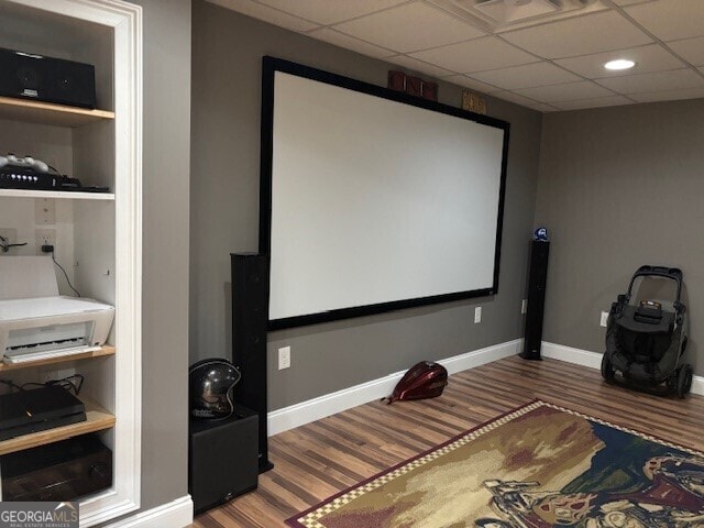 266 W Troutman Rd NE, Rome, GA 30165 - cinema room featuring recessed lighting, wood finished floors, visible vents, baseboards, and a paneled ceiling