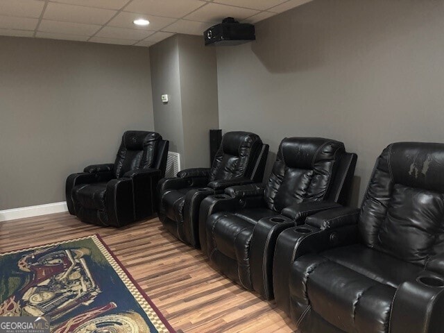 266 W Troutman Rd NE, Rome, GA 30165 - home theater featuring baseboards, a drop ceiling, and light wood finished floors