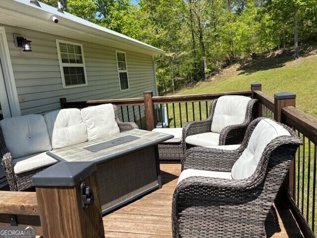 266 W Troutman Rd NE, Rome, GA 30165 - wooden deck with an outdoor hangout area