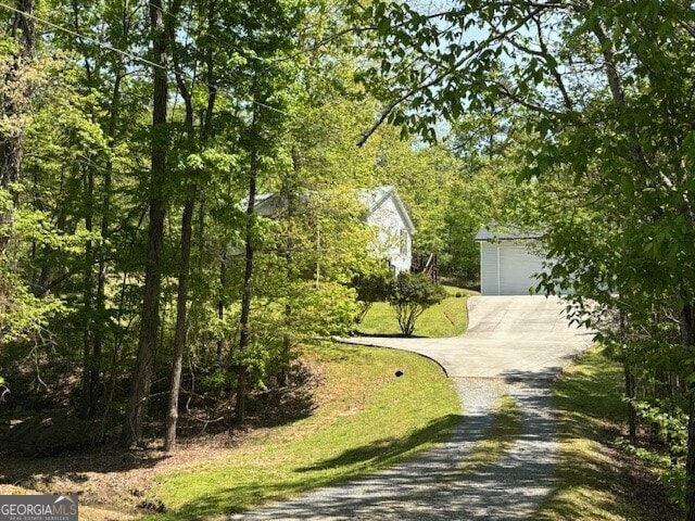 266 W Troutman Rd NE, Rome, GA 30165 - exterior space with a garage and concrete driveway