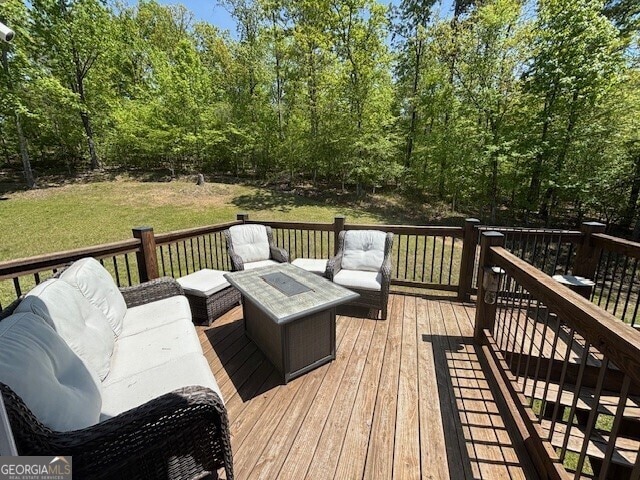 266 W Troutman Rd NE, Rome, GA 30165 - deck featuring a yard and an outdoor hangout area