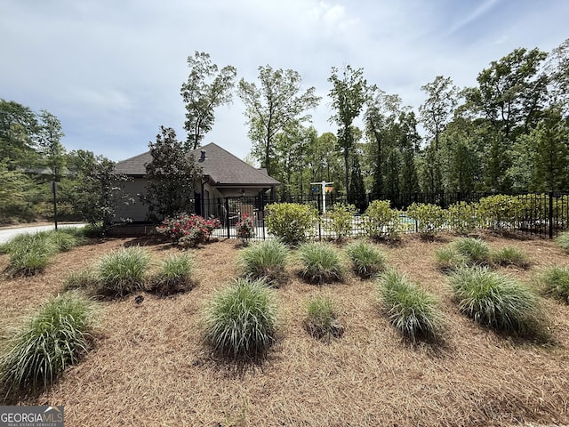 view of yard featuring fence