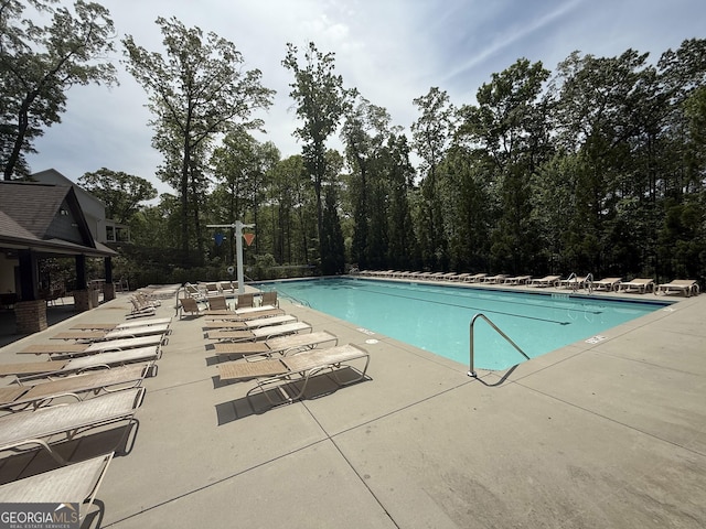 pool featuring a patio area