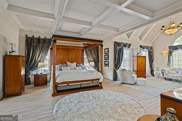 bedroom featuring beam ceiling, wood finished floors, and coffered ceiling