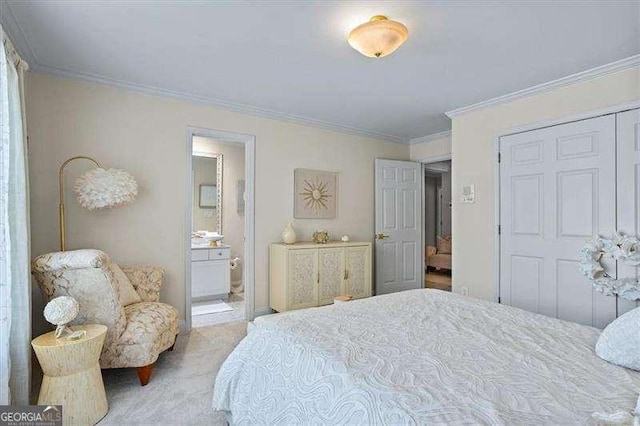 bedroom with crown molding, a closet, connected bathroom, and light carpet