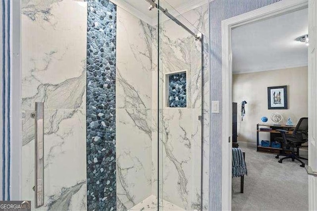 bathroom with a marble finish shower