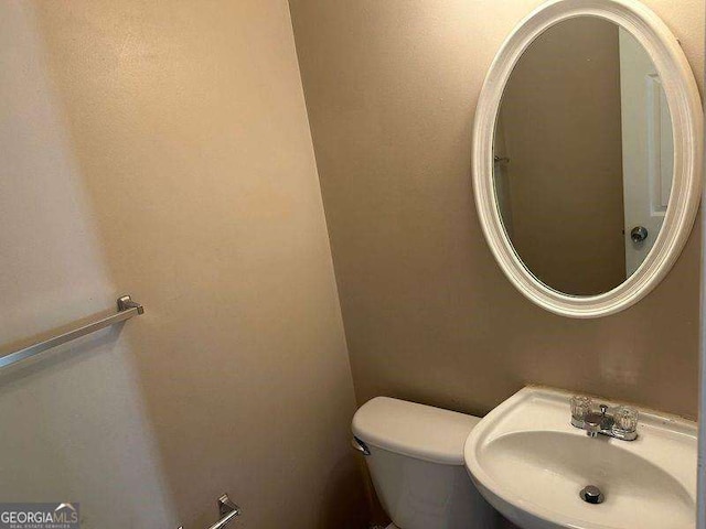 3334 Rockmill Dr, Ellenwood, GA 30294 - bathroom with toilet and a sink