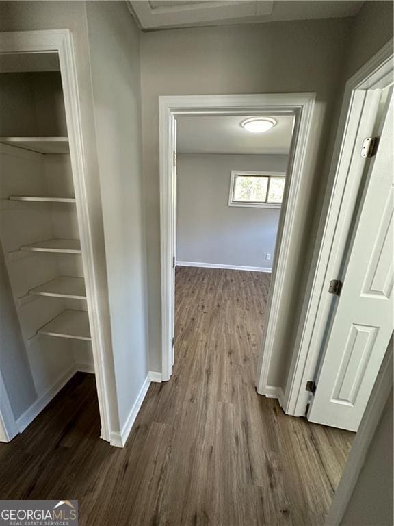 1401 Vesta Ave, East Point, GA 30344 - hallway featuring baseboards and dark wood-type flooring
